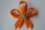 220-svatební vývazek oranžovo-oranžový se světle zelenou kytičkou